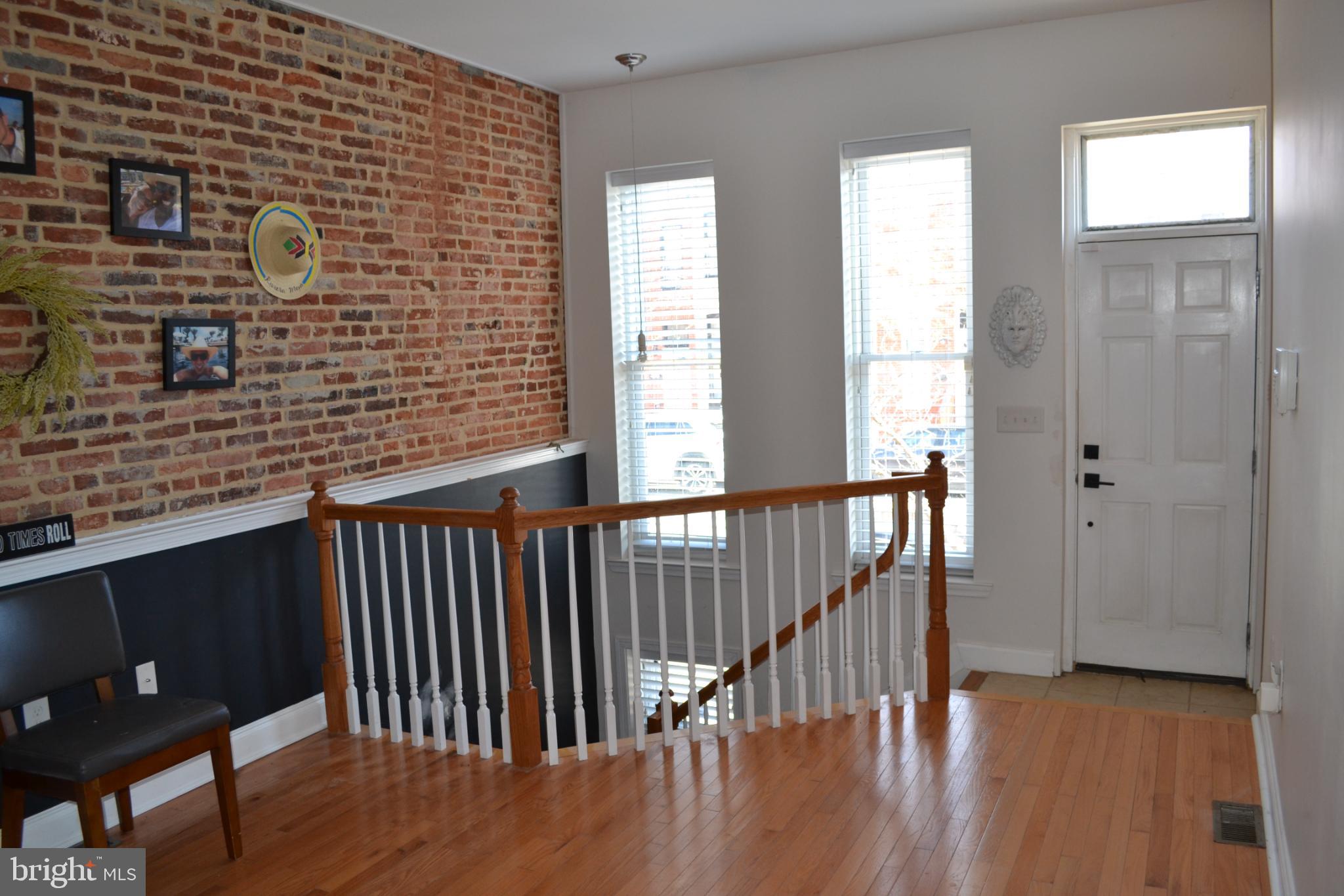 1410 North Bond Street Baltimore, MD 21213 - Photo 3 of 26 a view of a balcony with wooden floor