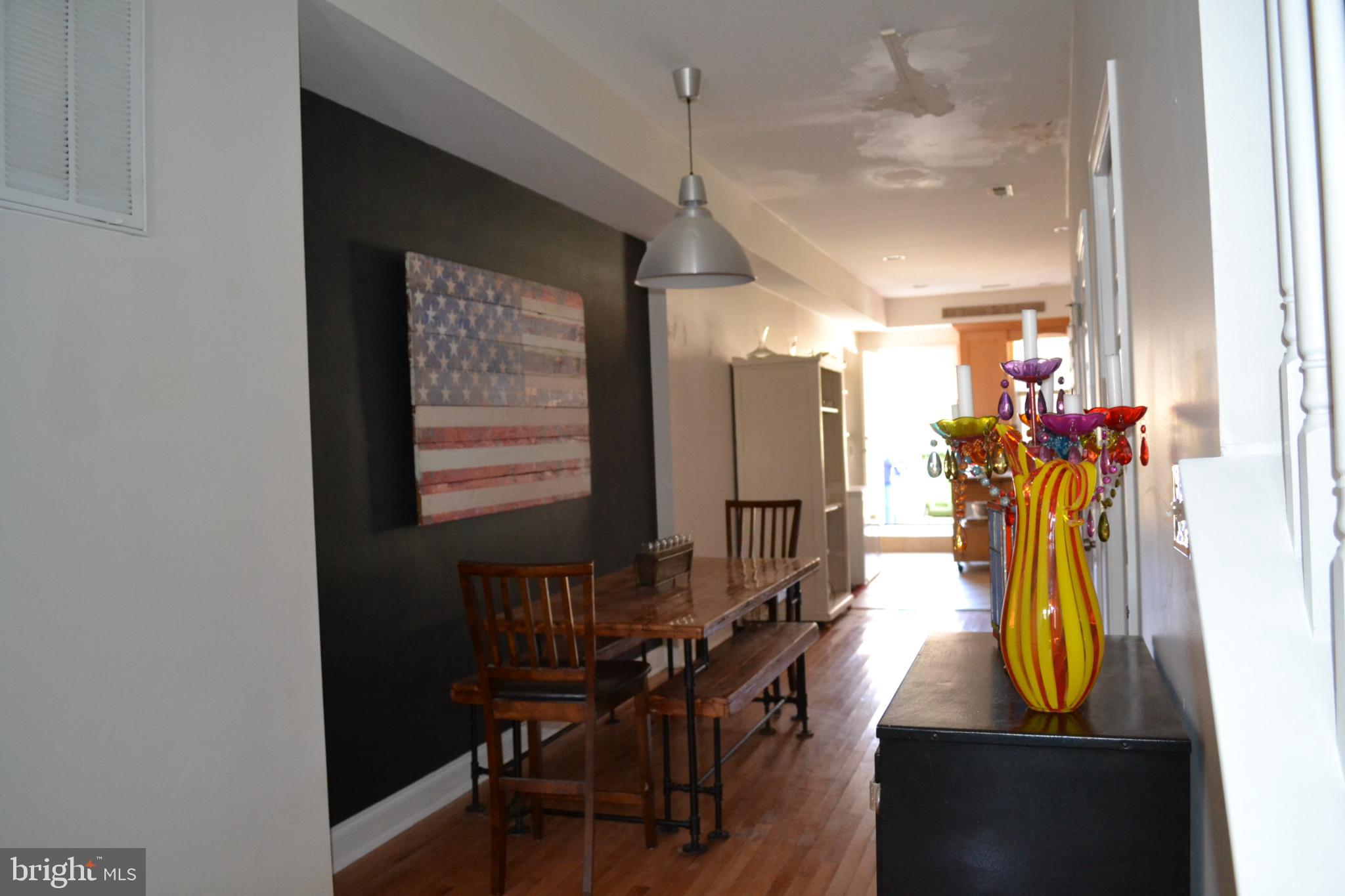 1410 North Bond Street Baltimore, MD 21213 - Photo 4 of 26 a view of a hallway with chairs