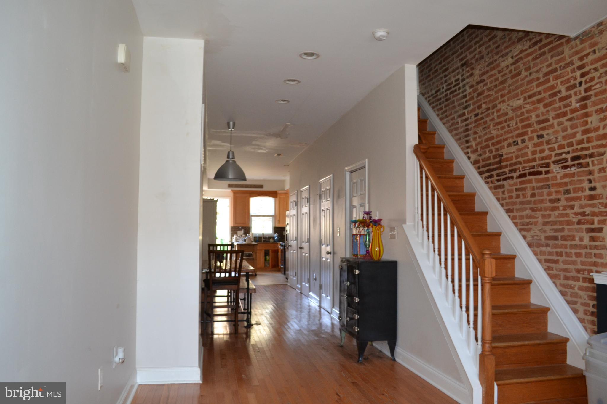 1410 North Bond Street Baltimore, MD 21213 - Photo 10 of 26 a view of entryway and hall with wooden floor