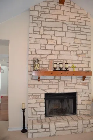 a fireplace with a sink