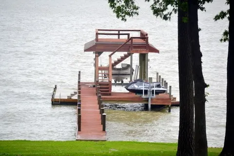 a view of swimming pool with a patio