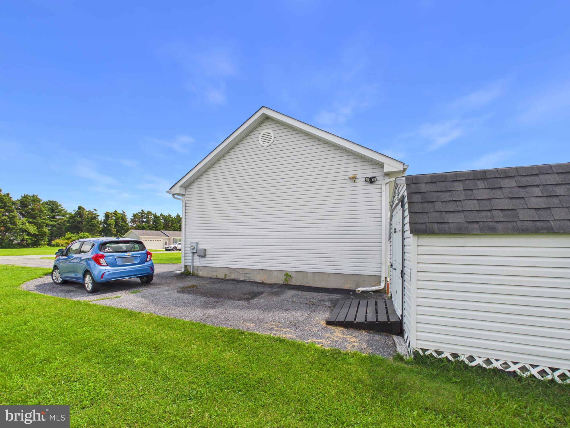 32 Sharon Road Millsboro, DE 19966 - Photo 32 of 40 Side Profile & Attached Garage Exterior
