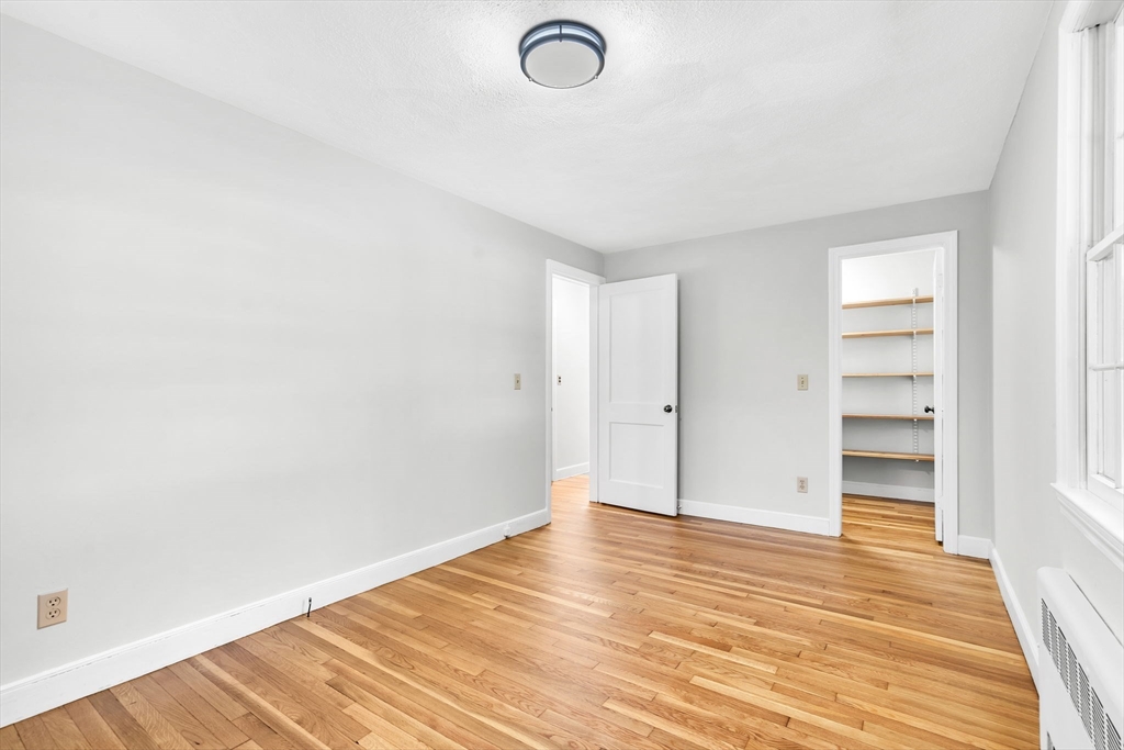35 Arrowhead Road Concord, MA 01742 - Photo 14 of 23 a view of a room with wooden floor and bathroom