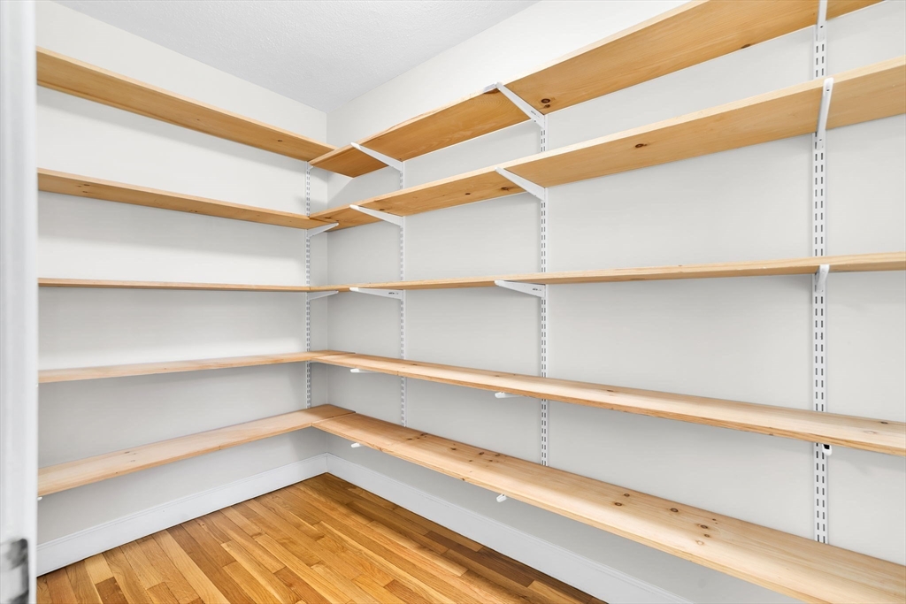 35 Arrowhead Road Concord, MA 01742 - Photo 15 of 23 a view of walk in closet with empty racks
