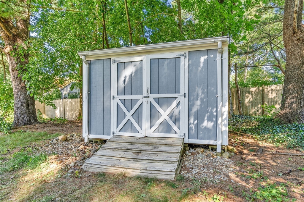 35 Arrowhead Road Concord, MA 01742 - Photo 21 of 23 a front view of a house with a yard