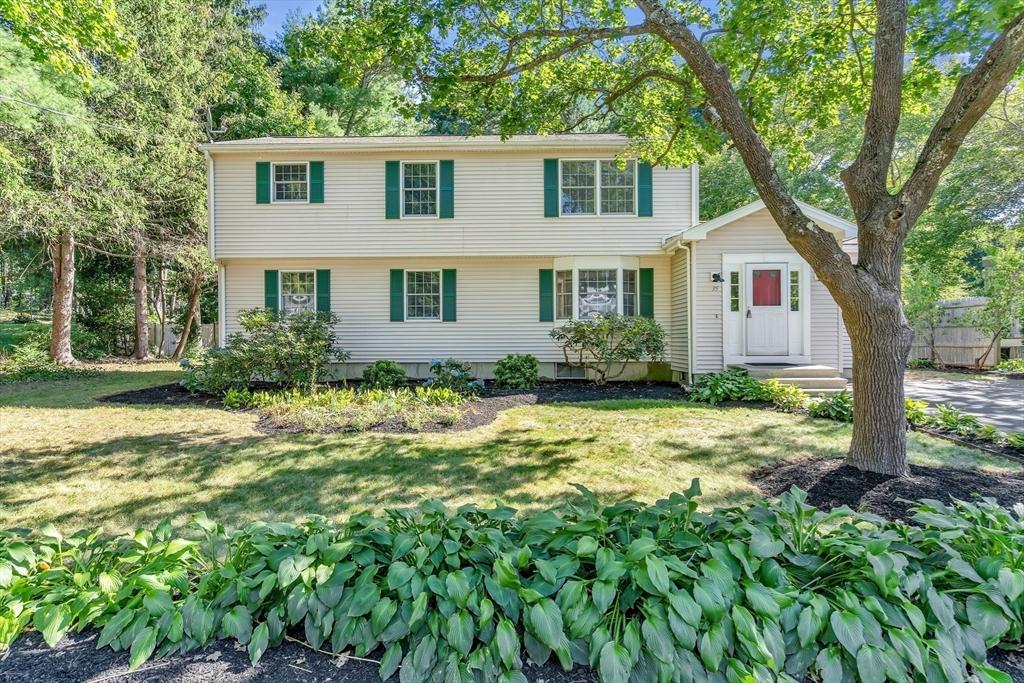35 Arrowhead Road Concord, MA 01742 - Photo 23 of 23 a front view of a house with garden