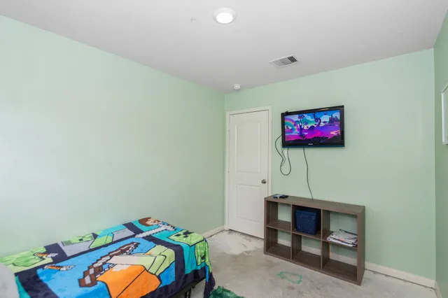 a view of a workspace with furniture