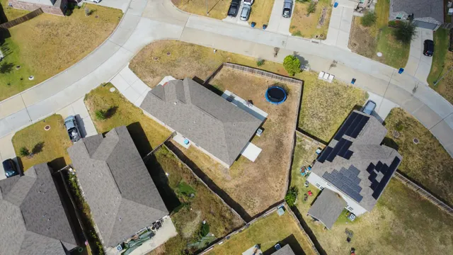 an aerial view of a fireplace dining room and wooden floor