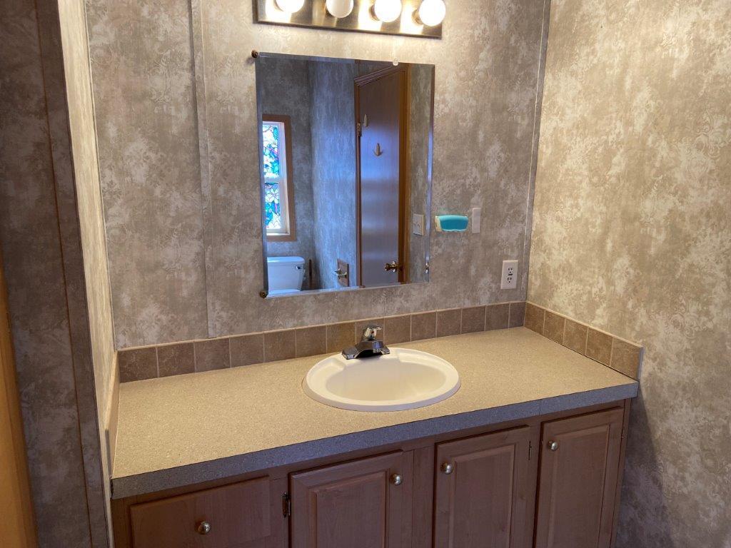 129 Shorey Road Winslow, ME 04901 - Photo 12 of 18 Attached Primary Bath
