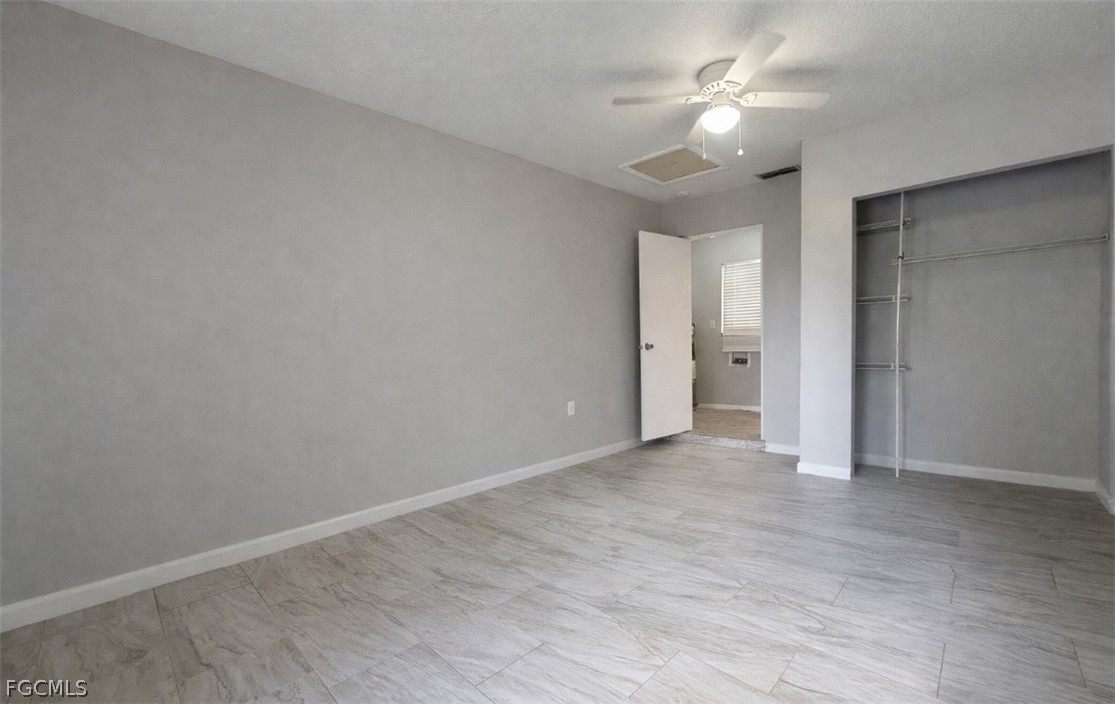 424 Cactus Circle Lehigh Acres, FL 33936 - Photo 15 of 18 wooden floor in an empty room