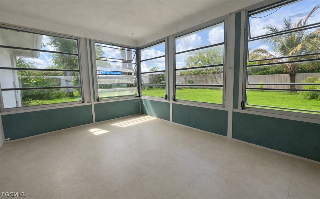 424 Cactus Circle Lehigh Acres, FL 33936 - Photo 18 of 18 a view of an empty room with a window