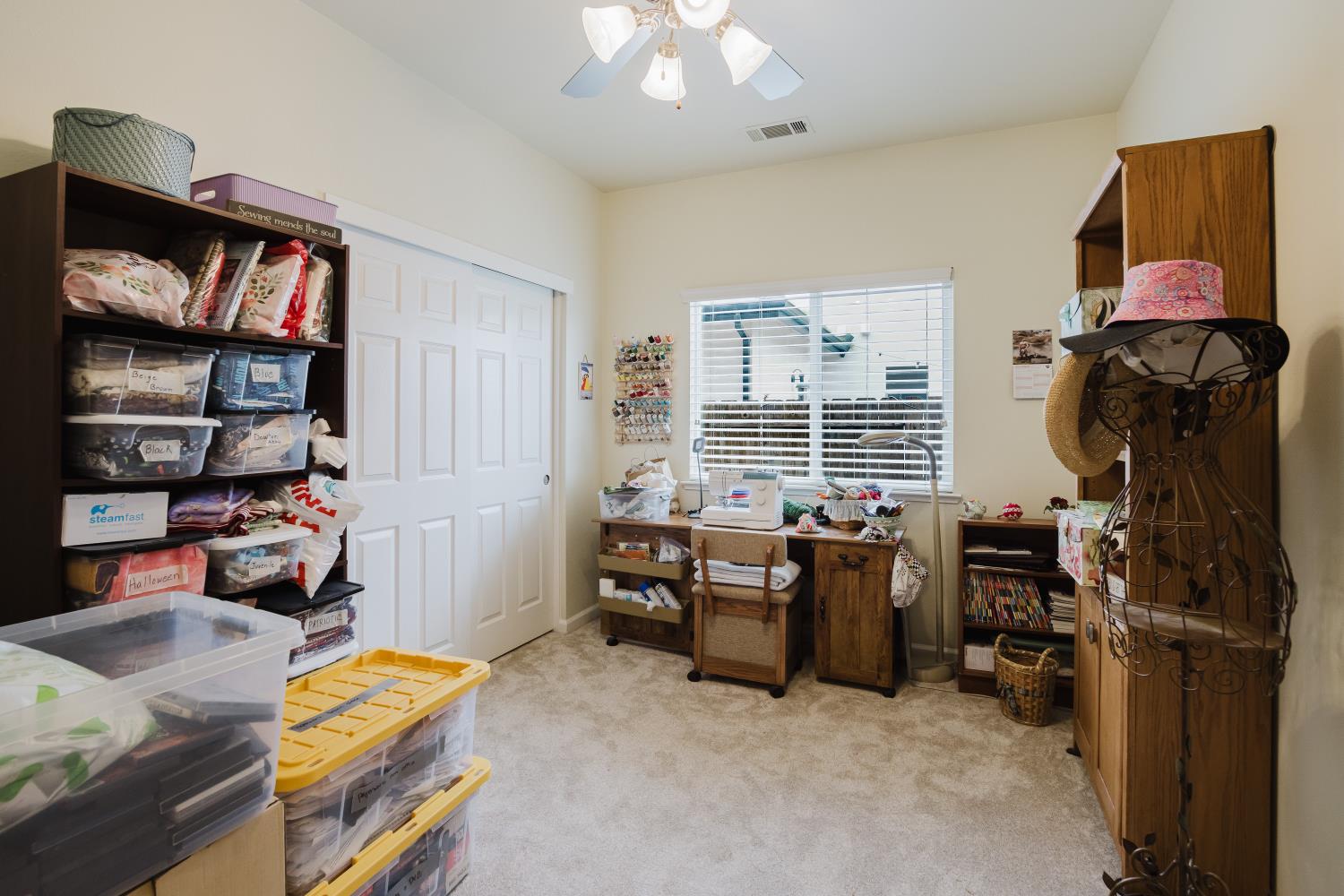 1634 Judith Way Escalon, CA 95320 - Photo 26 of 40 a view of a room with workspace and a window