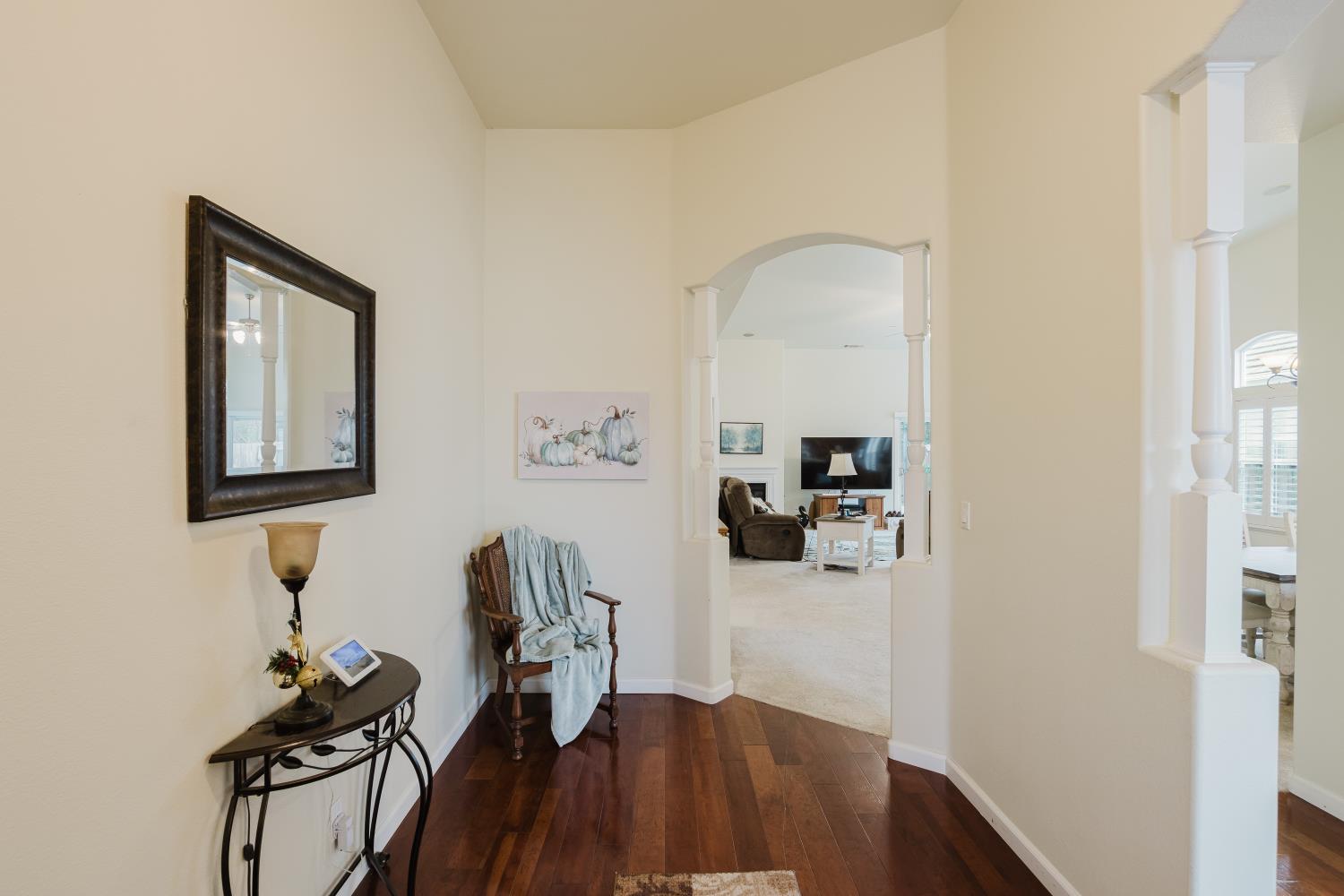 1634 Judith Way Escalon, CA 95320 - Photo 4 of 40 a view of a workspace with wooden floor and a workspace
