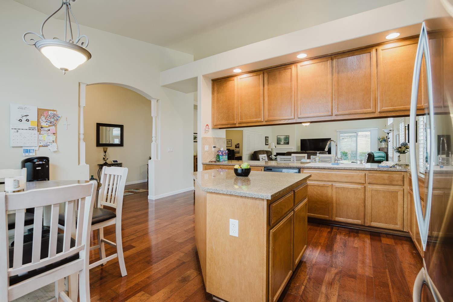 1634 Judith Way Escalon, CA 95320 - Photo 10 of 40 a kitchen with counter top space and wooden floor
