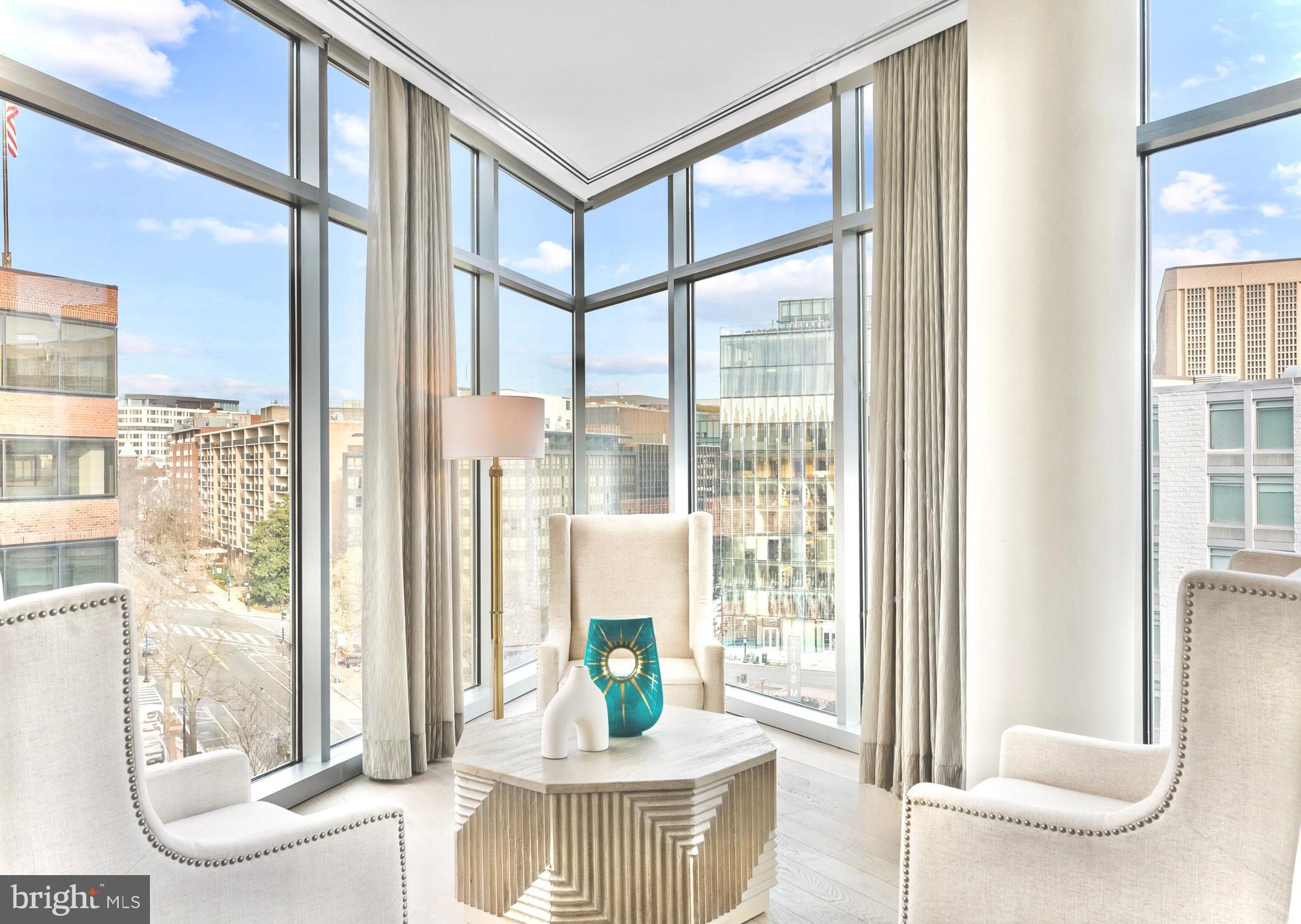 1177 22nd Street Northwest, Unit 7D Washington, DC 20037 - Photo 6 of 29 a living room with furniture and a window