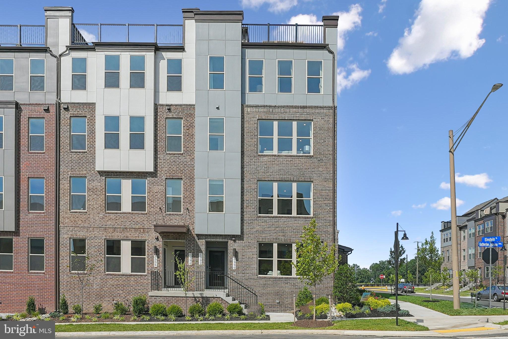 a front view of a building with street view