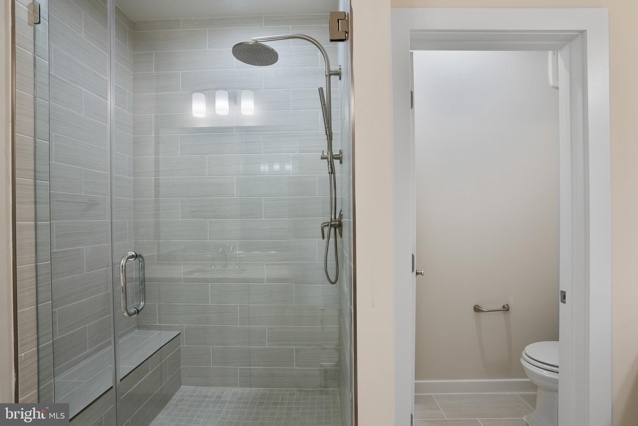 6701 Belcrest Road Hyattsville, MD 20782 - Photo 21 of 29 a bathroom with a shower
