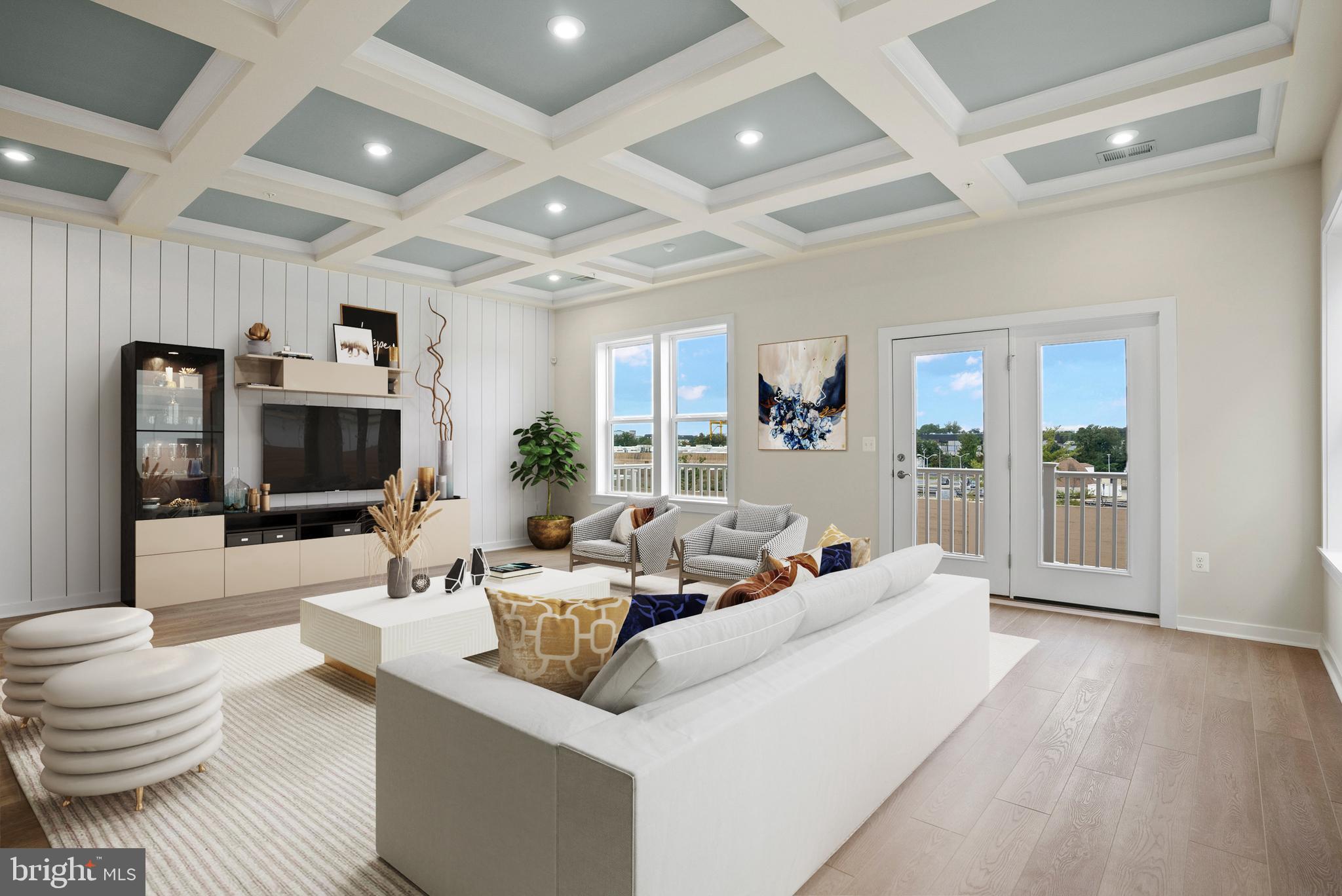 6701 Belcrest Road Hyattsville, MD 20782 - Photo 22 of 29 a living room with furniture and a flat screen tv