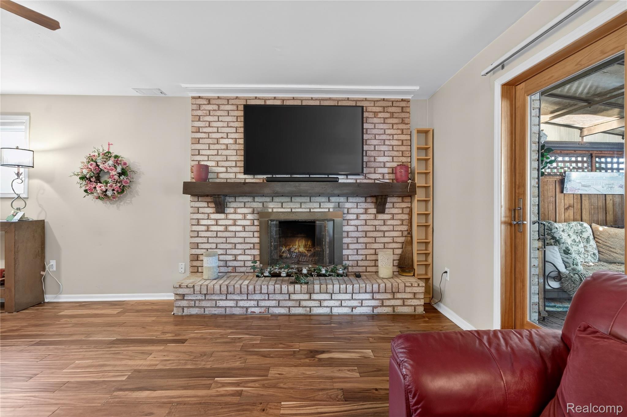 309 Antoinette Drive Rochester, MI 48309 - Photo 14 of 36 Family Room with heated floor for winter comfort.