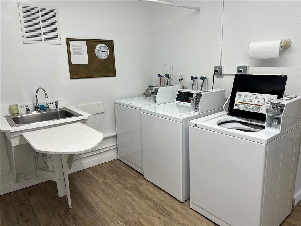 2100 Northeast 38th Street, Unit 124 Lighthouse Point, FL 33064 - Photo 21 of 30 a room with storage and utility