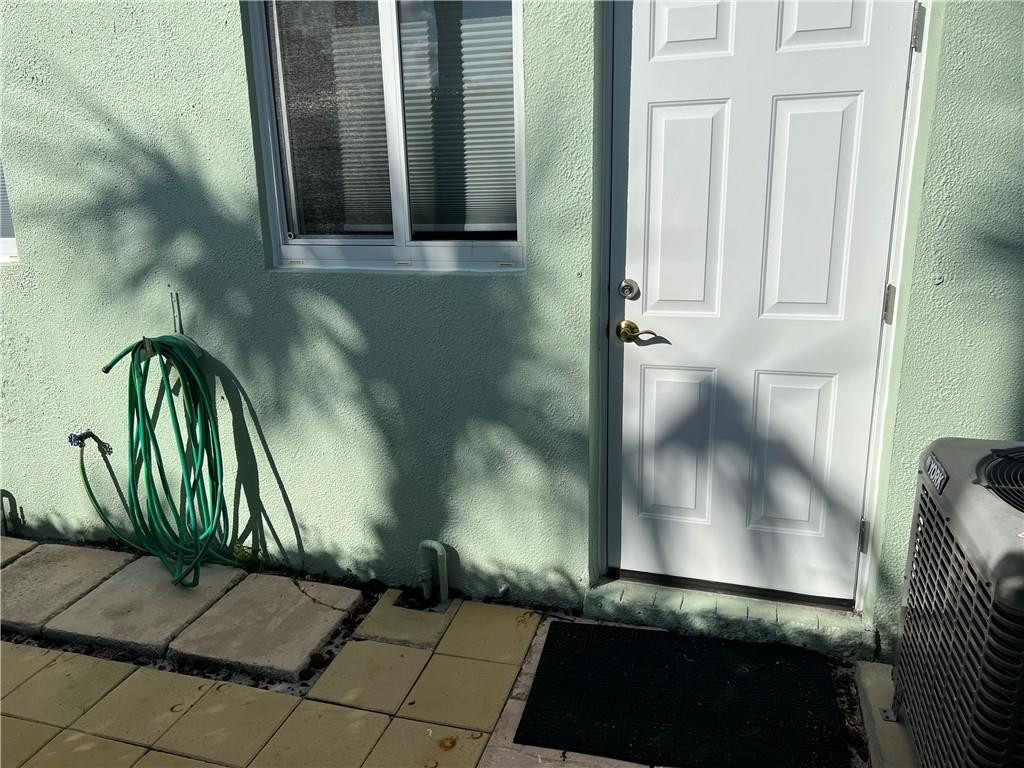 2100 Northeast 38th Street, Unit 124 Lighthouse Point, FL 33064 - Photo 9 of 30 a view of entryway