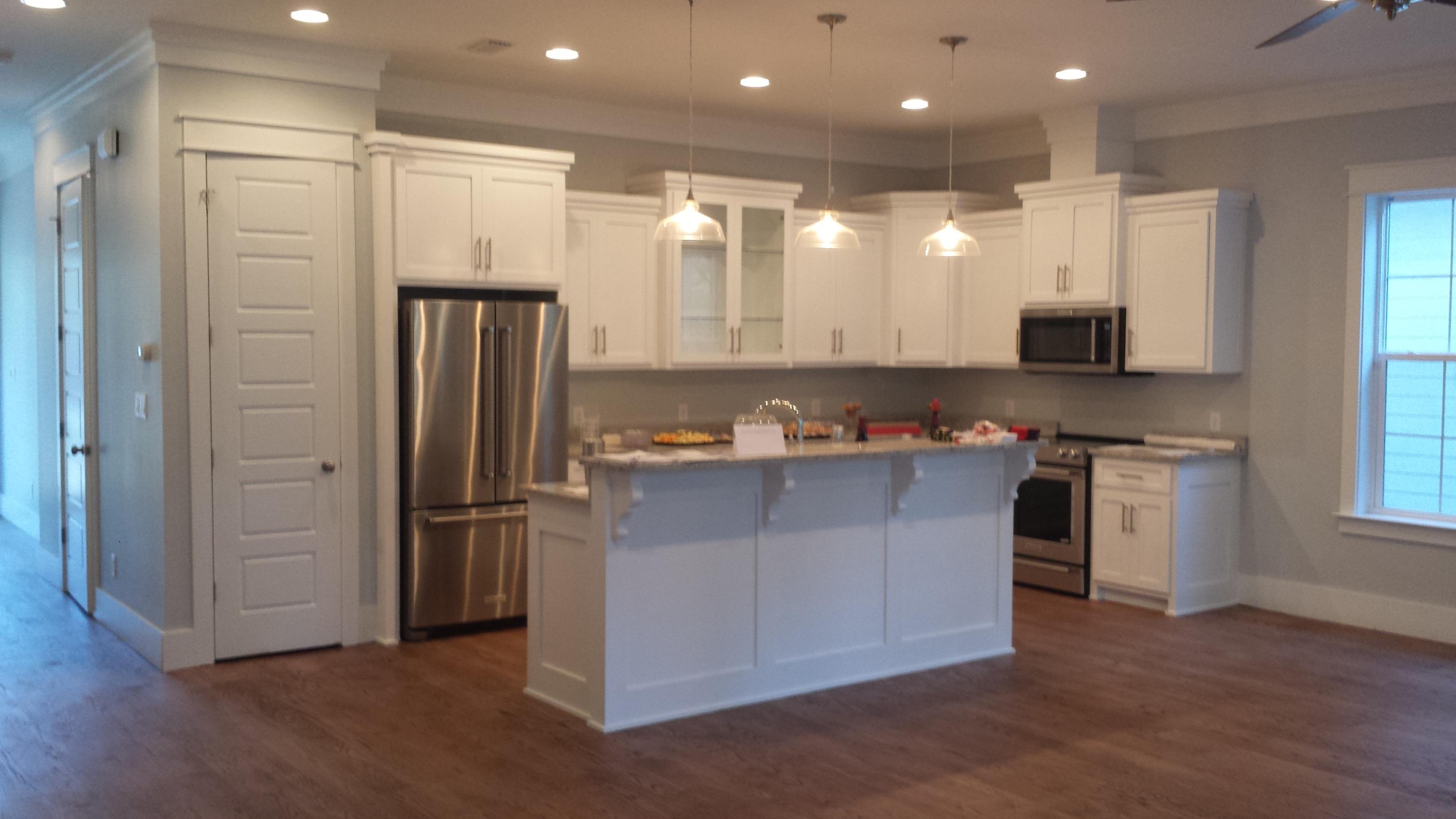39 Lifeguard Loop Seacrest, FL 32461 - Photo 2 of 59 a kitchen with stainless steel appliances granite countertop a refrigerator and a stove