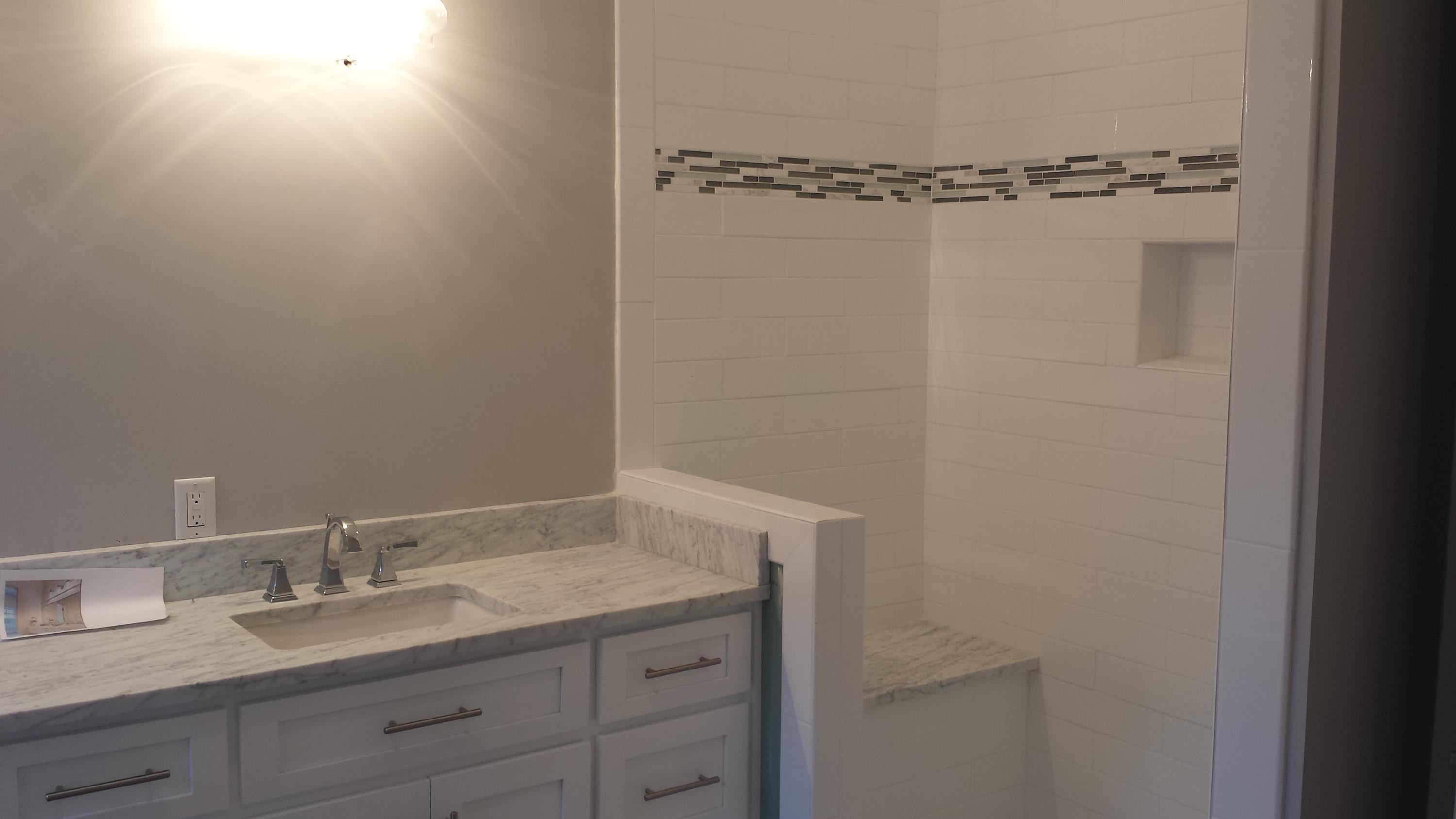 39 Lifeguard Loop Seacrest, FL 32461 - Photo 22 of 59 a bathroom with a granite countertop sink and vanity