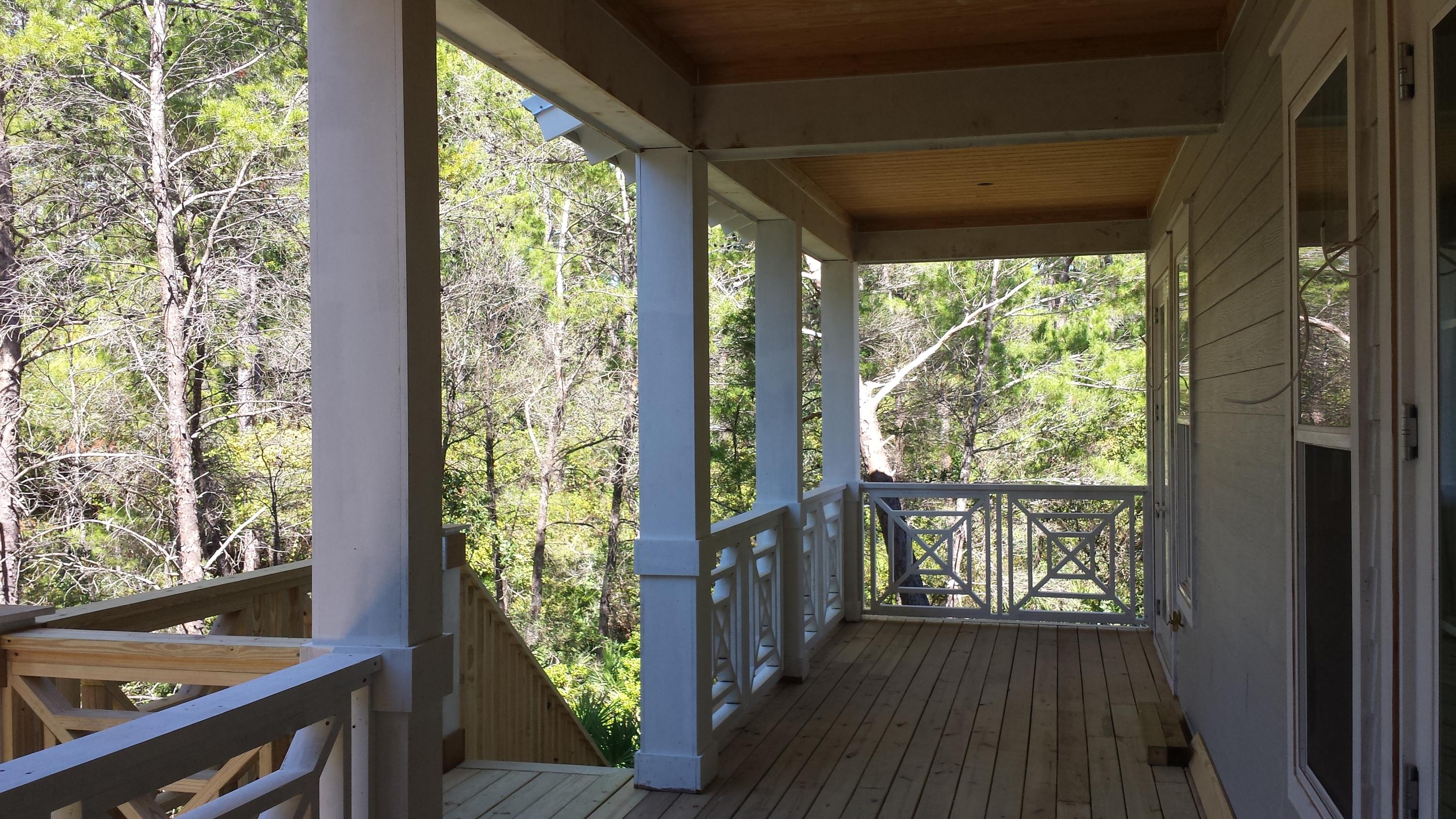 39 Lifeguard Loop Seacrest, FL 32461 - Photo 26 of 59 a view of a room with wooden floor and balcony