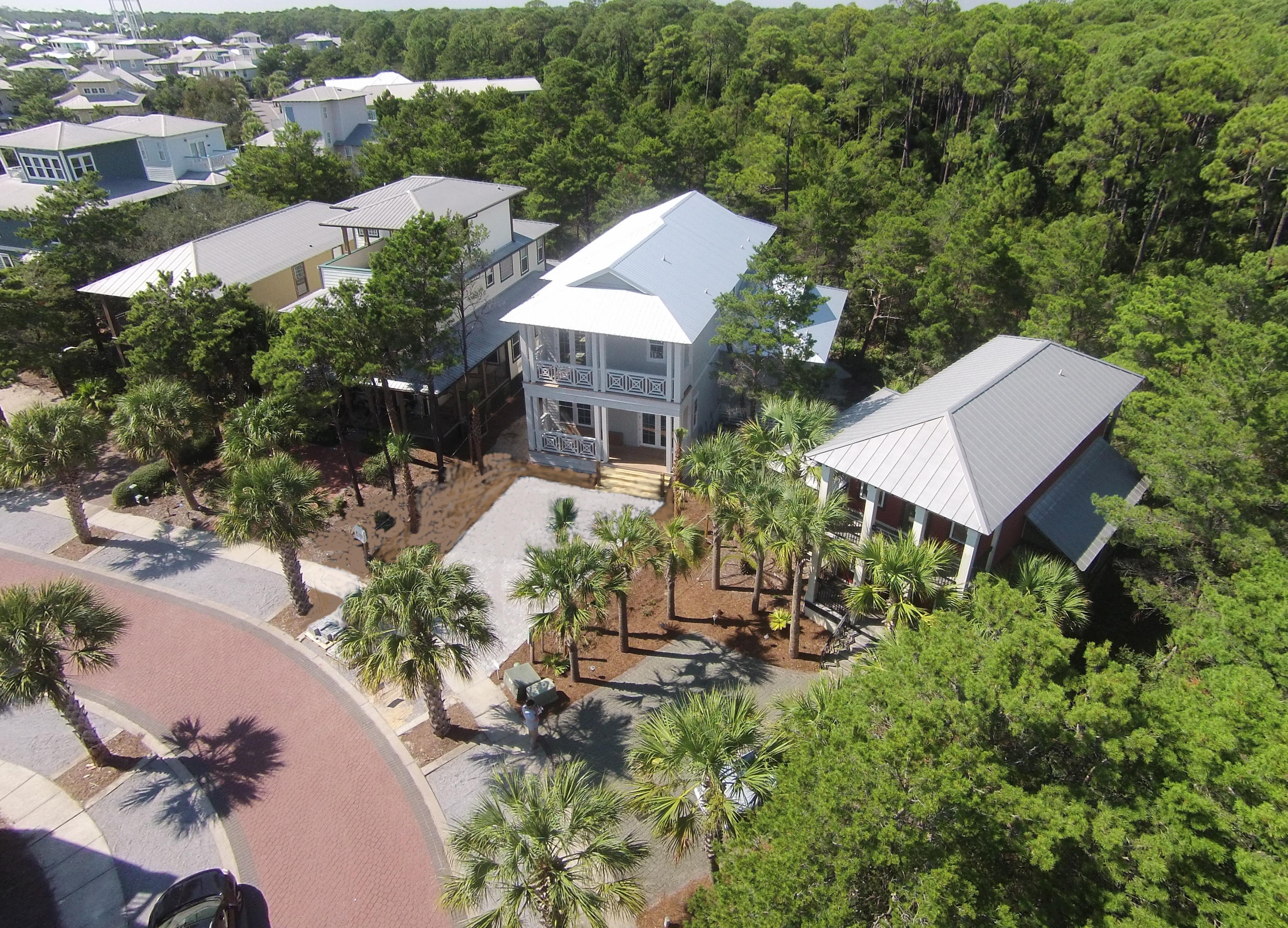 39 Lifeguard Loop Seacrest, FL 32461 - Photo 27 of 59 an aerial view of a house with a yard and lake view