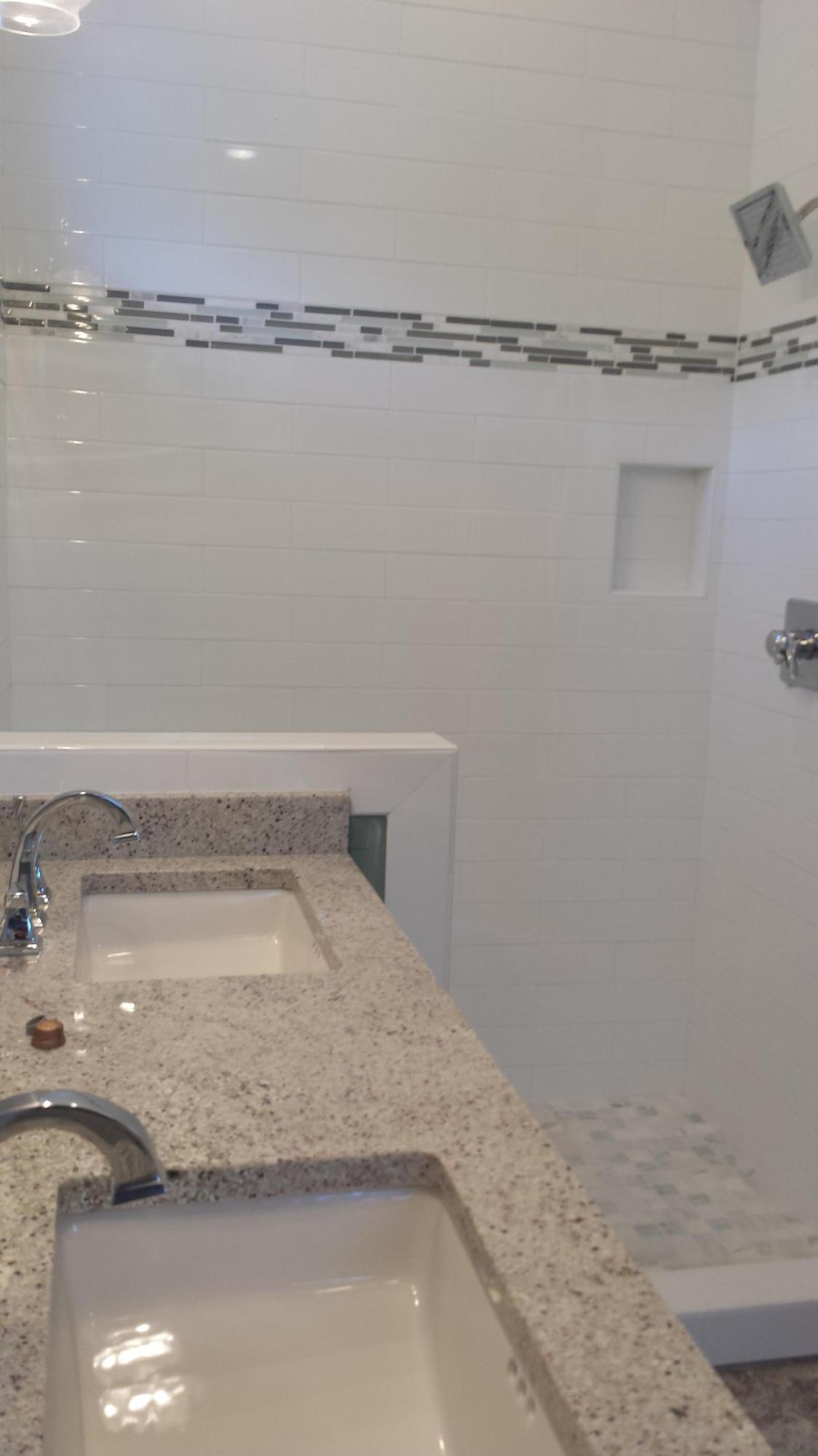 39 Lifeguard Loop Seacrest, FL 32461 - Photo 29 of 59 a bathroom with a bathtub