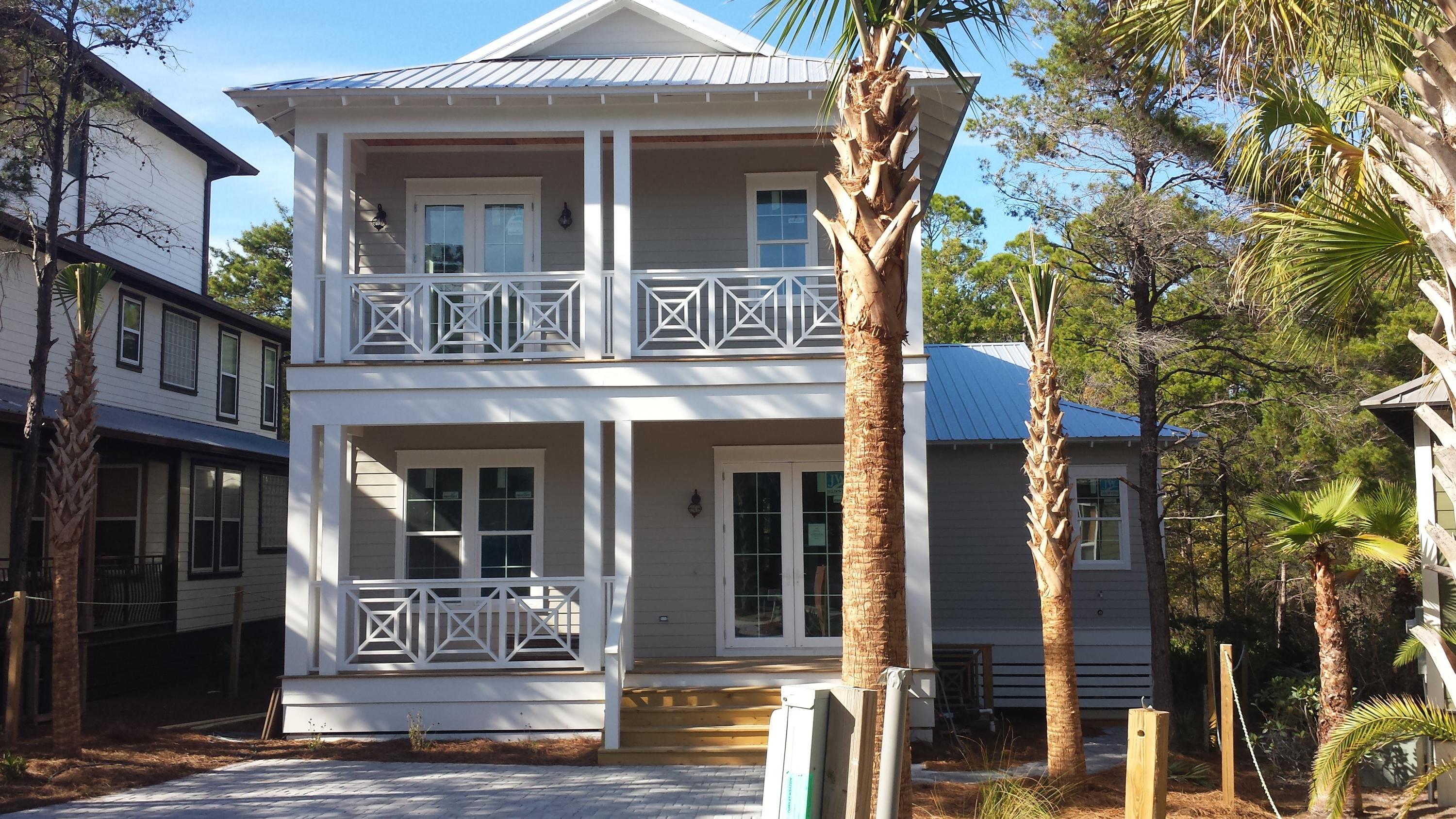 39 Lifeguard Loop Seacrest, FL 32461 - Photo 47 of 59 a front view of a house with glass windows
