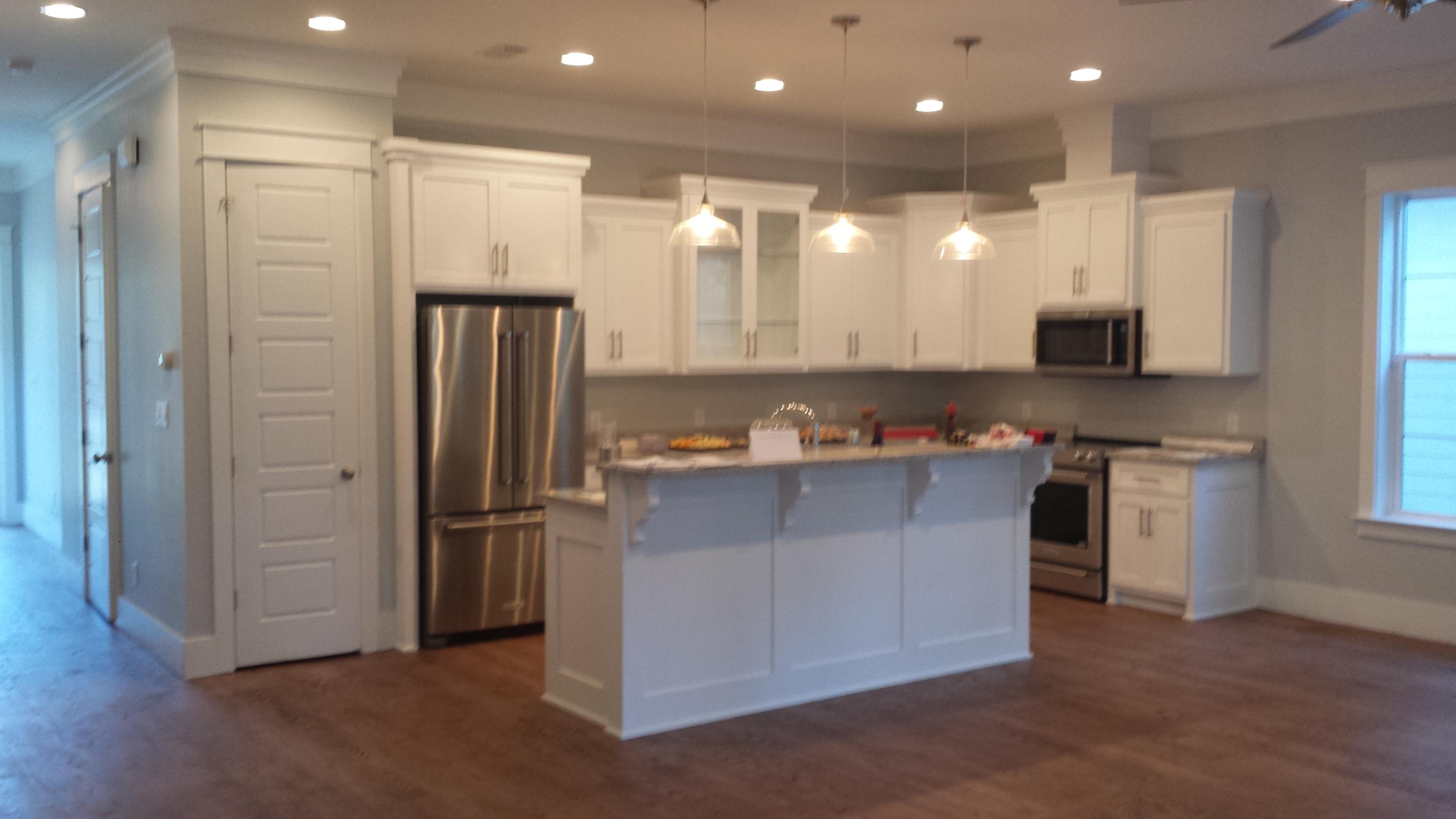 39 Lifeguard Loop Seacrest, FL 32461 - Photo 6 of 59 a kitchen with stainless steel appliances granite countertop a refrigerator and a stove