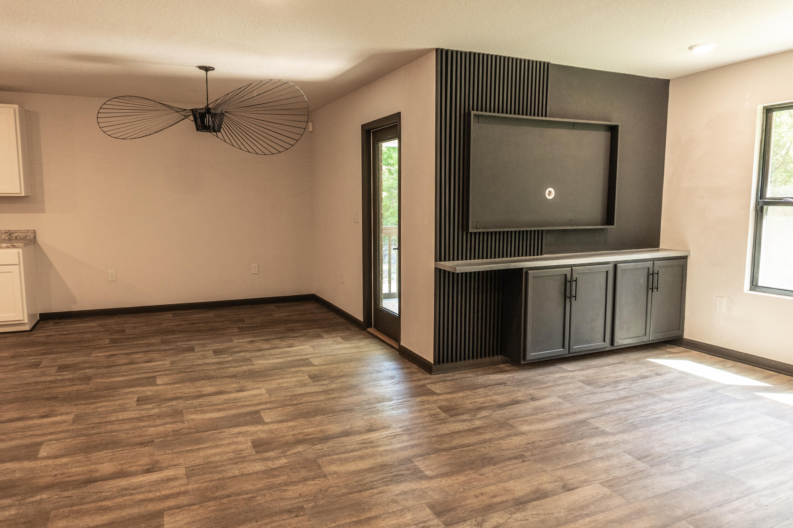 3476 Sparco Drive Crestview, FL 32539 - Photo 5 of 24 a view of a livingroom with wooden floor