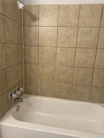 a bathroom with a bathtub