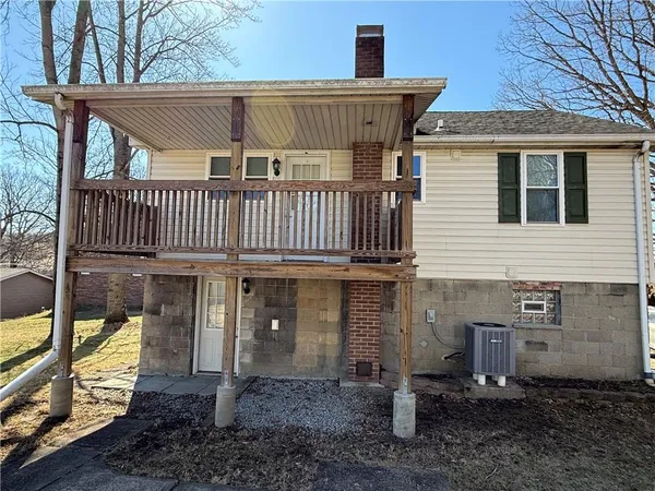 a view of a house with a porch