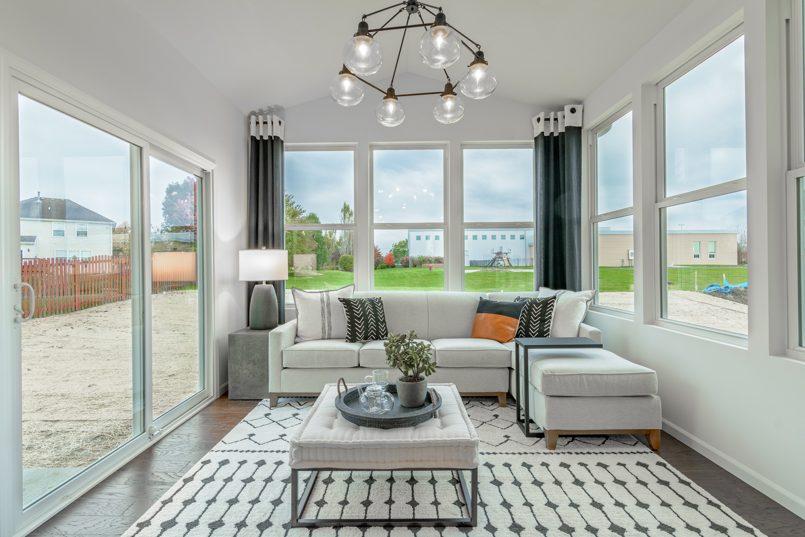 591 North Highlander Way Addison, IL 60101 - Photo 13 of 25 a living room with furniture and a large window