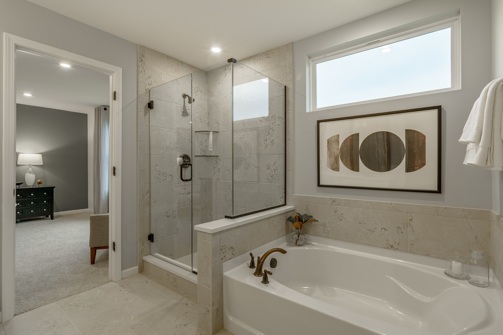 591 North Highlander Way Addison, IL 60101 - Photo 24 of 25 a bathroom with a bathtub and a shower