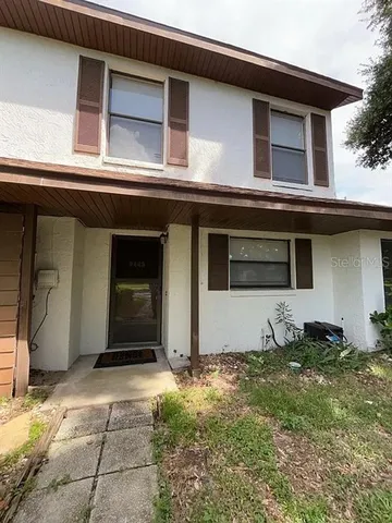 a house with yard in front of it
