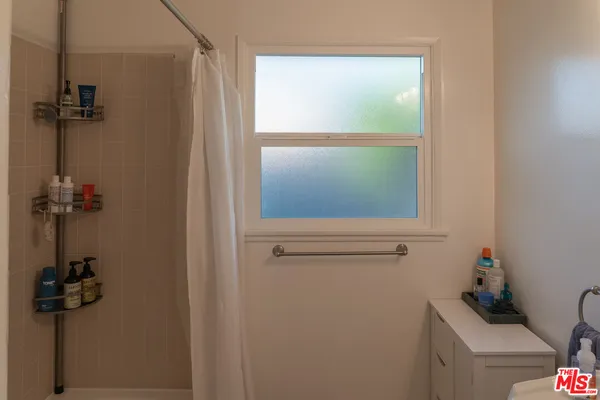 a view of a outdoor sitting area with furniture and garden