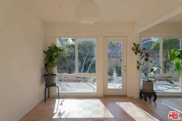 a workspace with furniture and a window