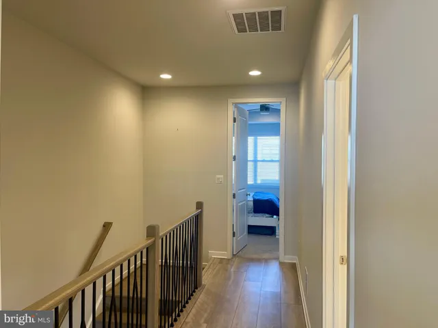 a view of outdoor space with wooden floor