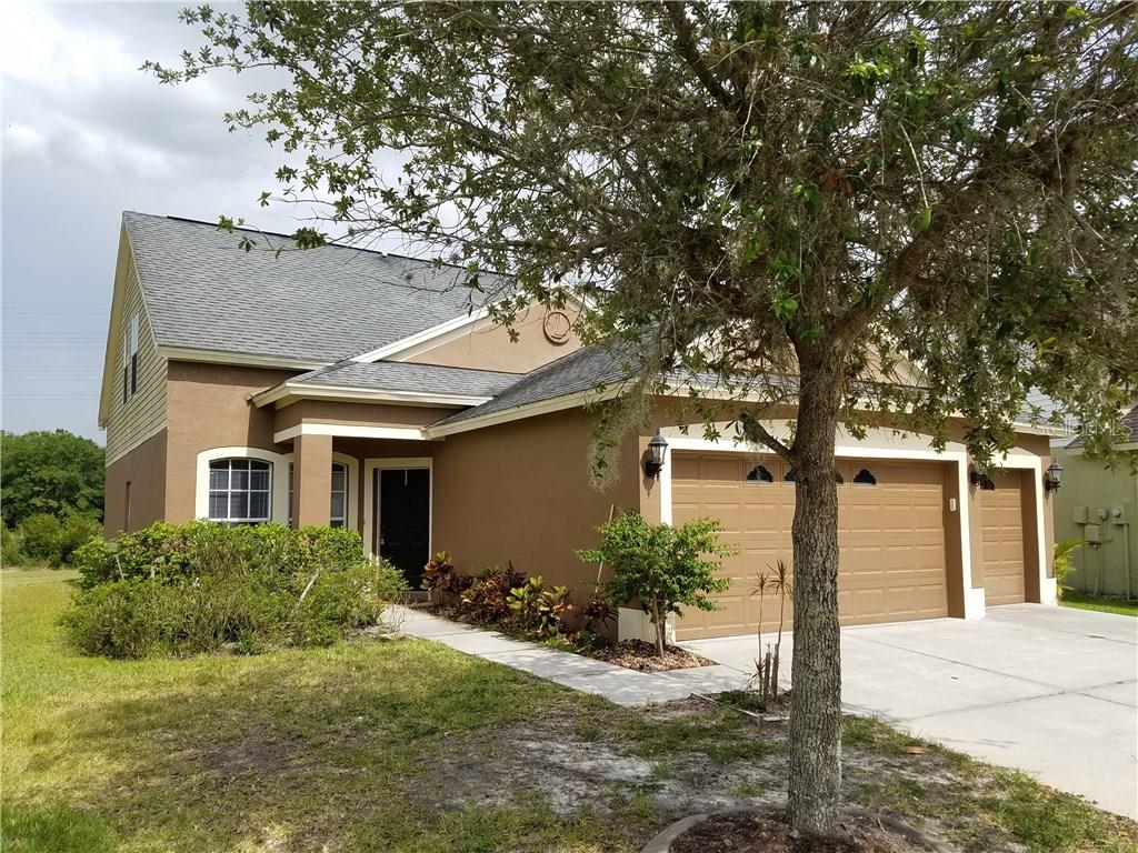 6511 Bridgecrest Drive Lithia, FL 33547 - Photo 1 of 1 a front view of a house with a yard