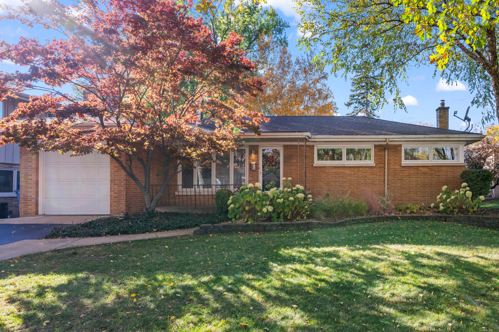 906 South Tower Lane Mount Prospect, IL 60056 - Photo 1 of 24 a front view of a house with garden