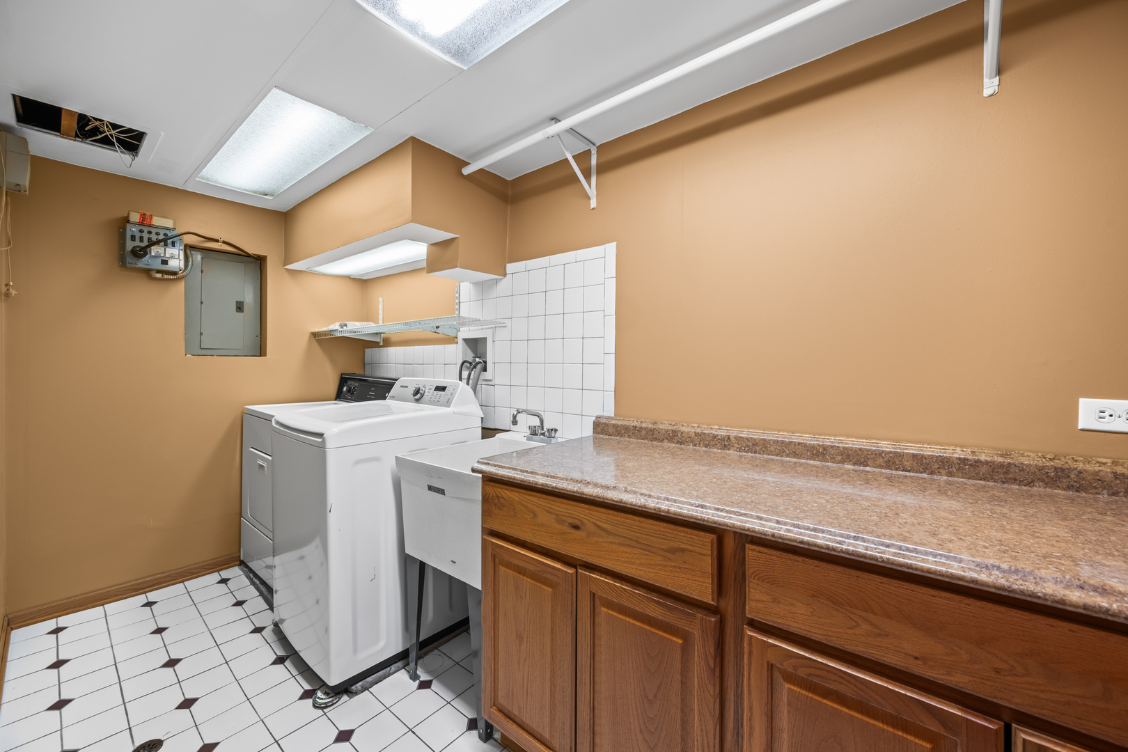 906 South Tower Lane Mount Prospect, IL 60056 - Photo 16 of 24 a utility room with sink dryer and washer