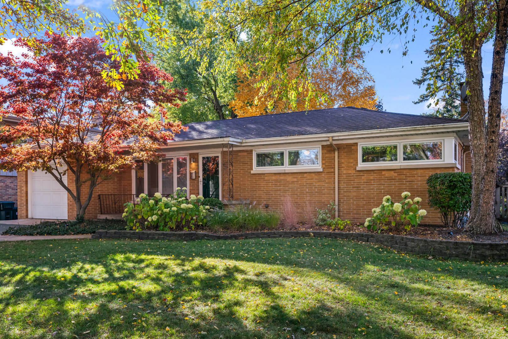 906 South Tower Lane Mount Prospect, IL 60056 - Photo 2 of 24 a front view of a house with garden