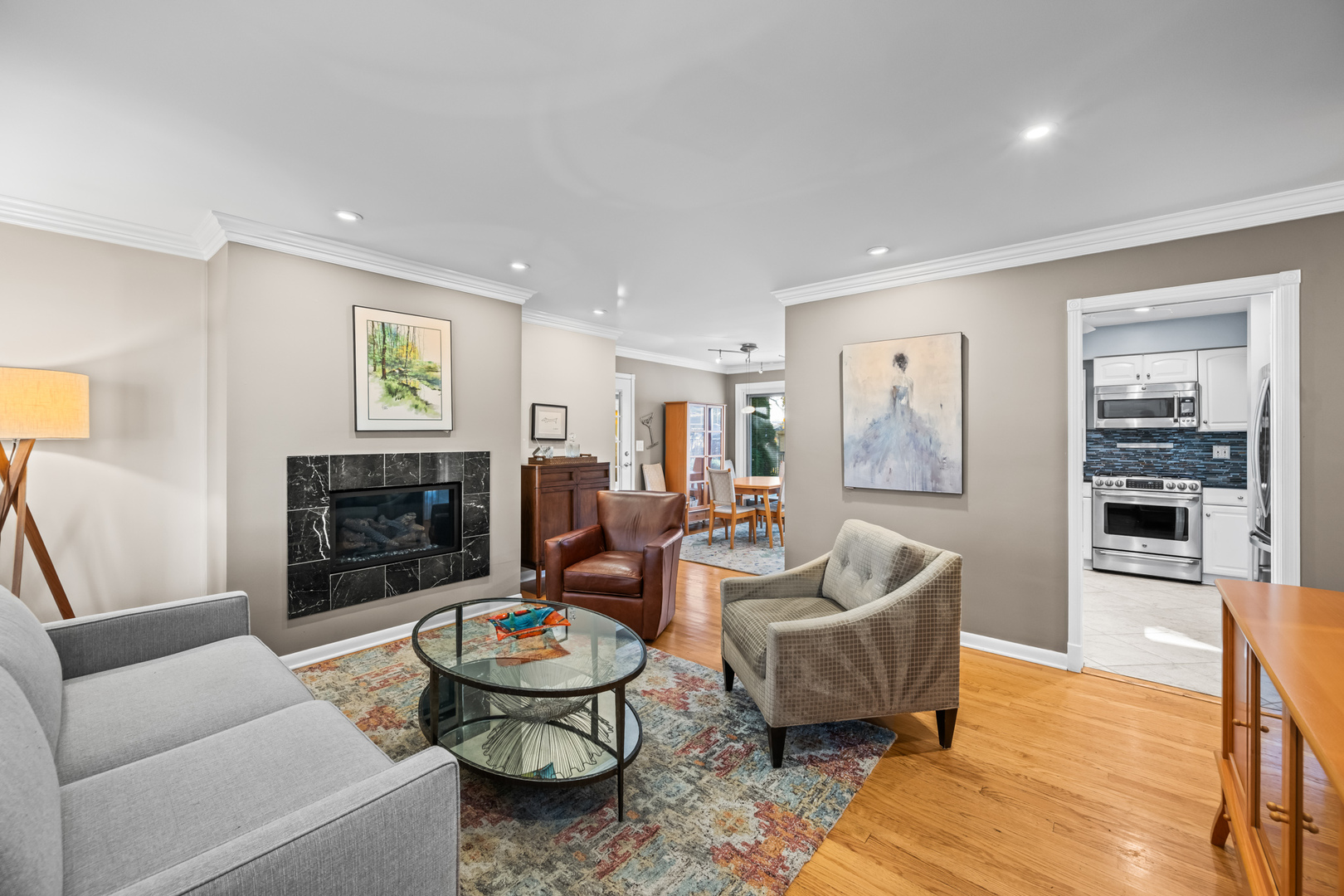 906 South Tower Lane Mount Prospect, IL 60056 - Photo 4 of 24 a living room with furniture and a fireplace