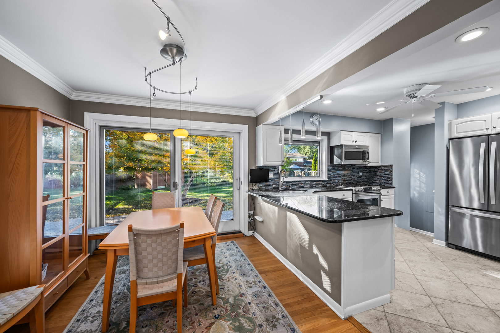 906 South Tower Lane Mount Prospect, IL 60056 - Photo 6 of 24 a kitchen with stainless steel appliances granite countertop a stove and refrigerator