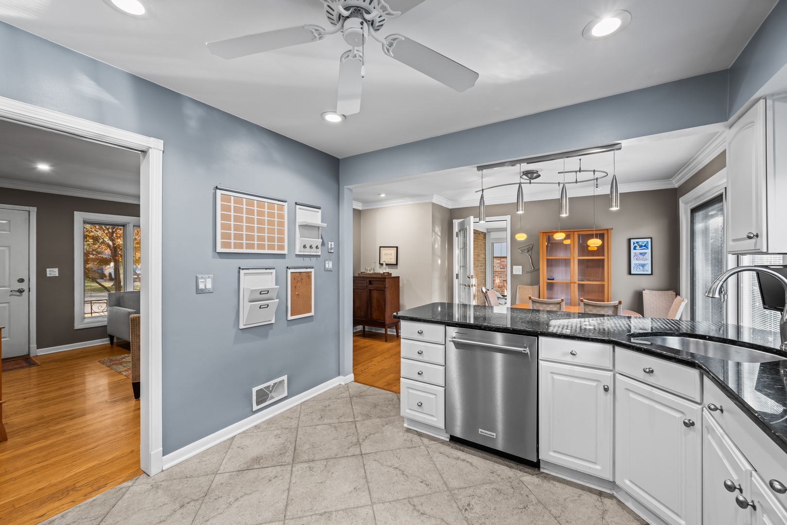906 South Tower Lane Mount Prospect, IL 60056 - Photo 8 of 24 a kitchen with stainless steel appliances granite countertop a sink and cabinets