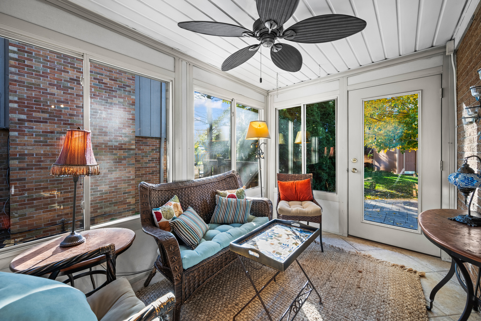 906 South Tower Lane Mount Prospect, IL 60056 - Photo 10 of 24 a living room with furniture and a floor to ceiling window