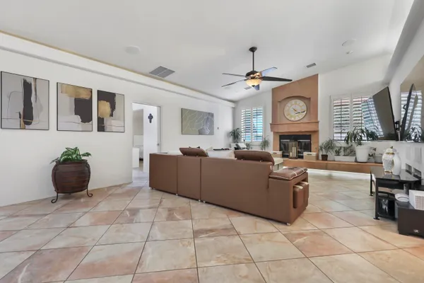 a kitchen with granite countertop a stove and a sink